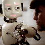 Video on humanoid research with iCub baby robot in Juergen Schmidhuber's lab