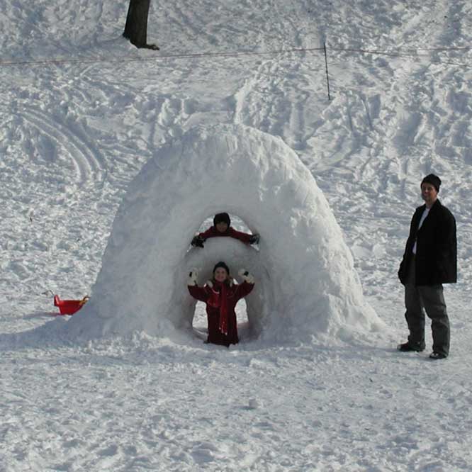 Leonie & Julia & Juergen Schmidhuber 
building a Snow Arc