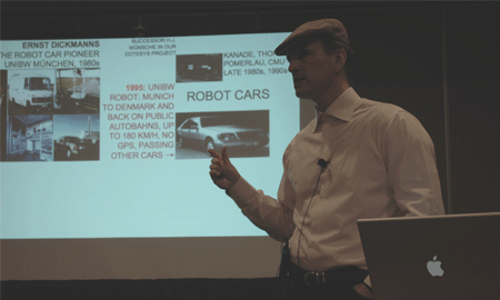 Schmidhuber praising the achievements of Dickmanns
  during his AGI-09 keynote, 2009