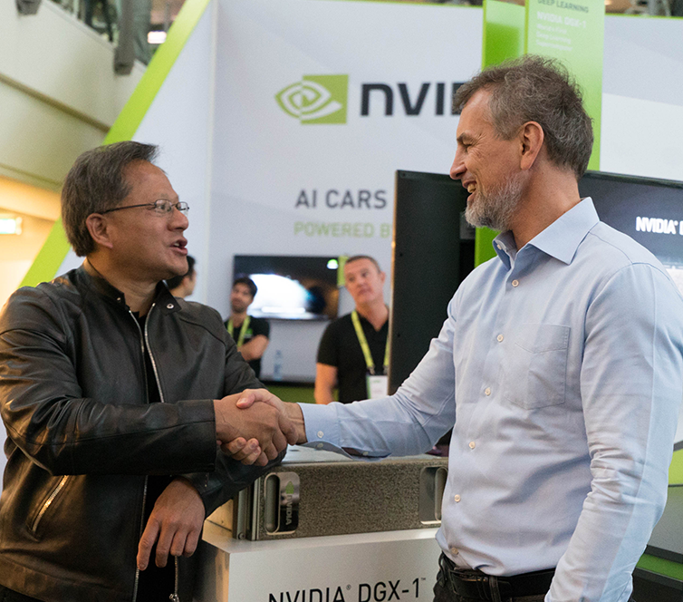 Jensen Huang, CEO of NVIDIA, which became the world's most valuable company in 2024, and Juergen Schmidhuber