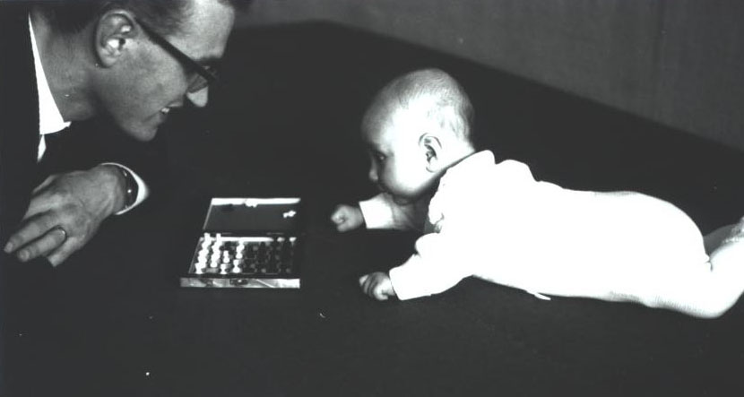 1963: Juergen Schmidhuber's dad Johann Schmidhuber (left) who regularly beat Juergen (right) in the game of chess, often within less than 90 moves